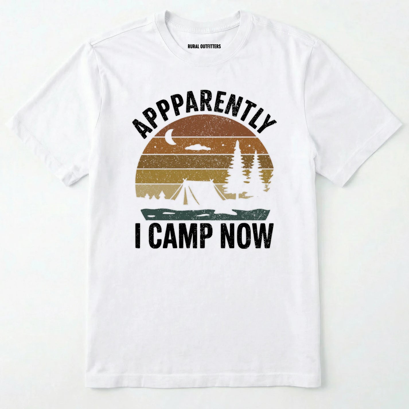 White t-shirt with ⊜apparently i camp now⊝ in white text and a vintage sunset camping scene on a white background.