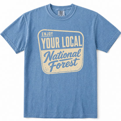 Blue Jean short-sleeve t-shirt with a vintage-style cream graphic on the chest that reads 'ENJOY YOUR LOCAL National Forest'.