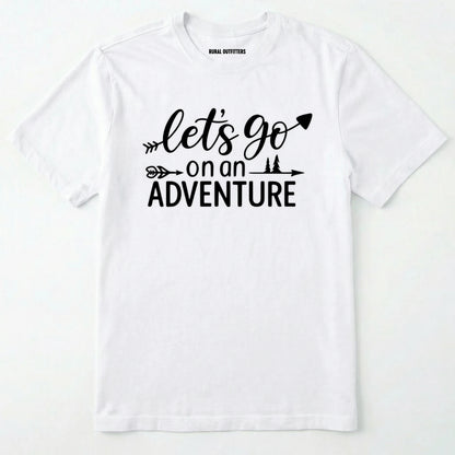 White lets go on an adventure shirt with an arrow and trees graphic on a light grey background.