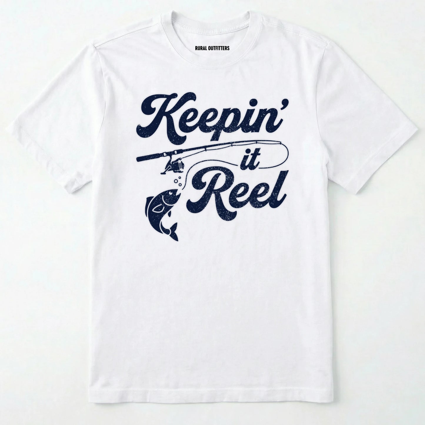 White t-shirt with 'keepin' it reel' text and fishing rod graphic on a white background