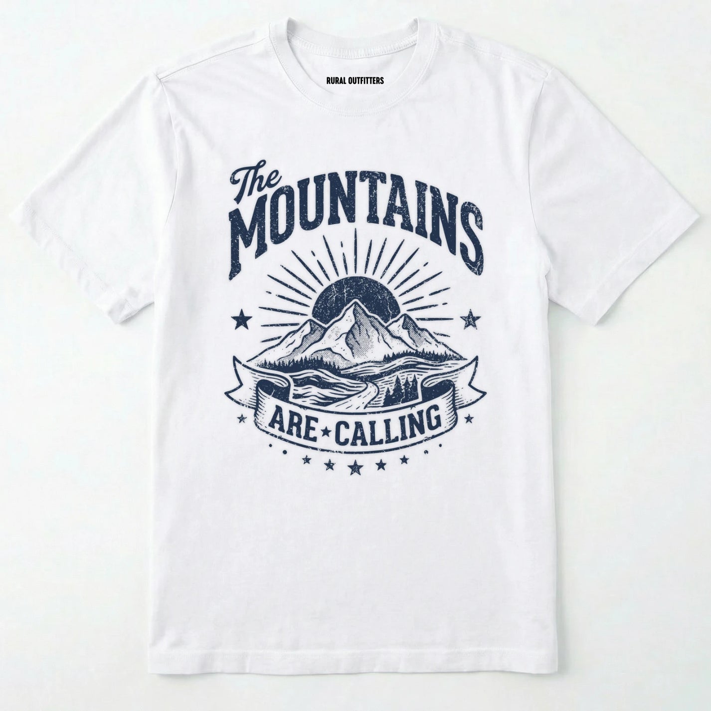 White t-shirt with 'the mountains are calling' graphic design on a white background