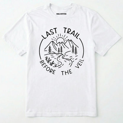 White nature-themed last trail before the veil shirt with line-art mountain scene on a white background.