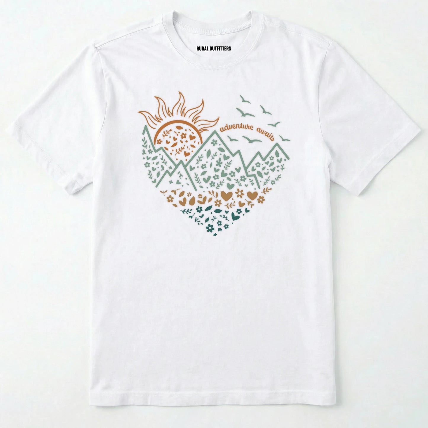 White adventure awaits shirt with a floral nature heart, mountain and sun illustration on a white background.