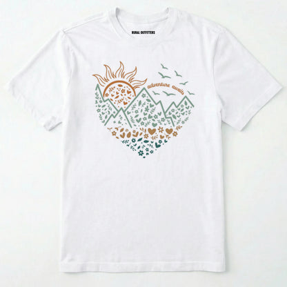 White adventure awaits shirt with a floral nature heart, mountain and sun illustration on a white background.