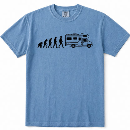 Blue Jean short-sleeve crewneck t-shirt featuring a black graphic print of the evolution of man leading up to a walking figure next to an RV, displayed on a clean white background.