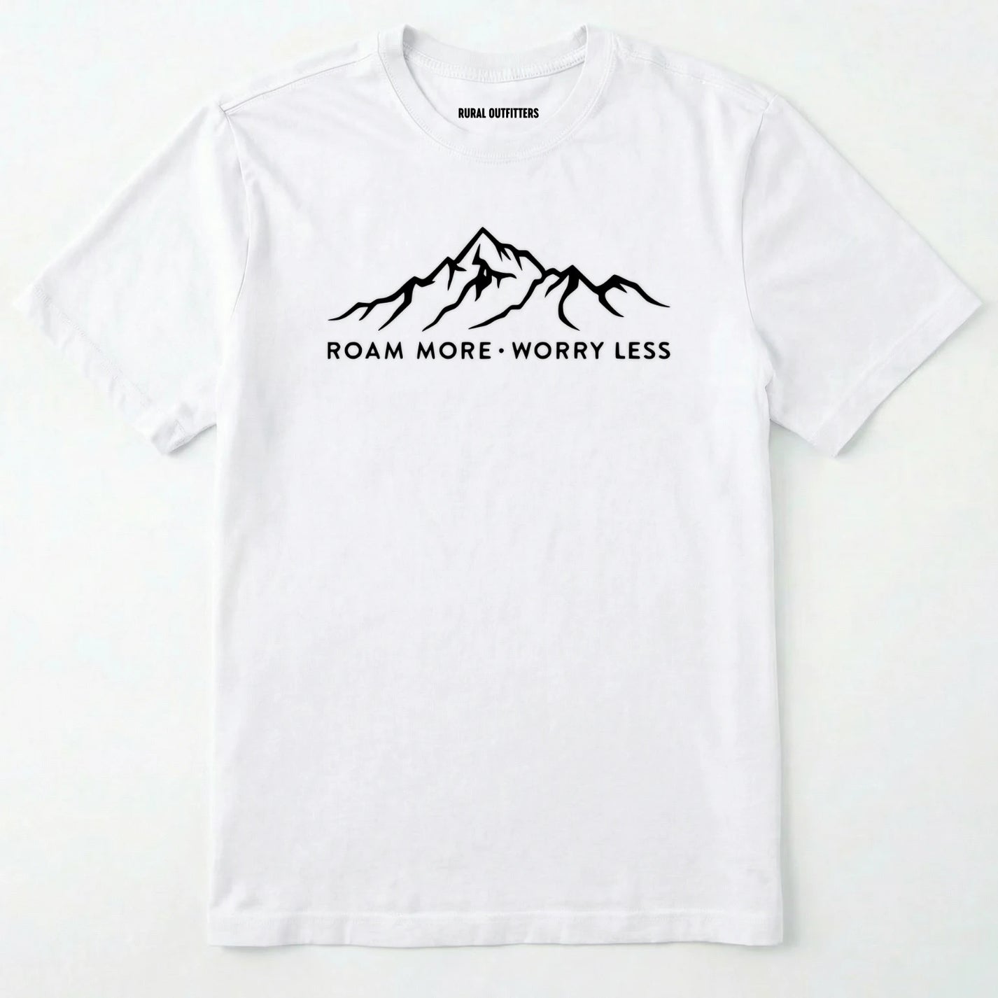 White rocky mountain shirt with a white mountain graphic and text 'roam more worry less' on a white background