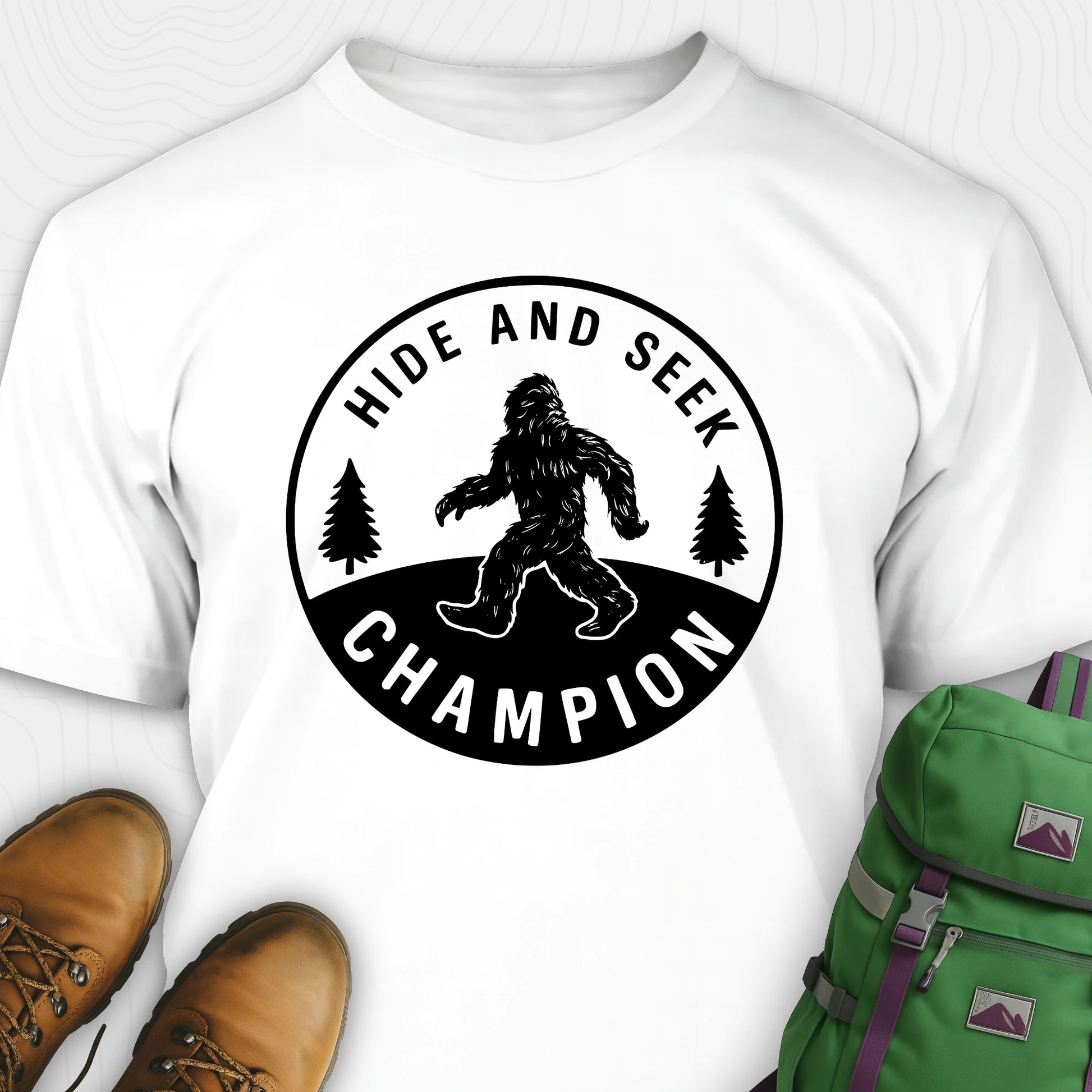 White bigfoot hide and seek champion shirt with forest emblem