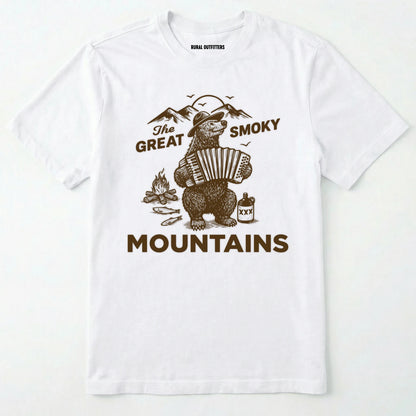 White the great smoky mountains t-shirt with smoky the bear playing the accordion graphic and text.
