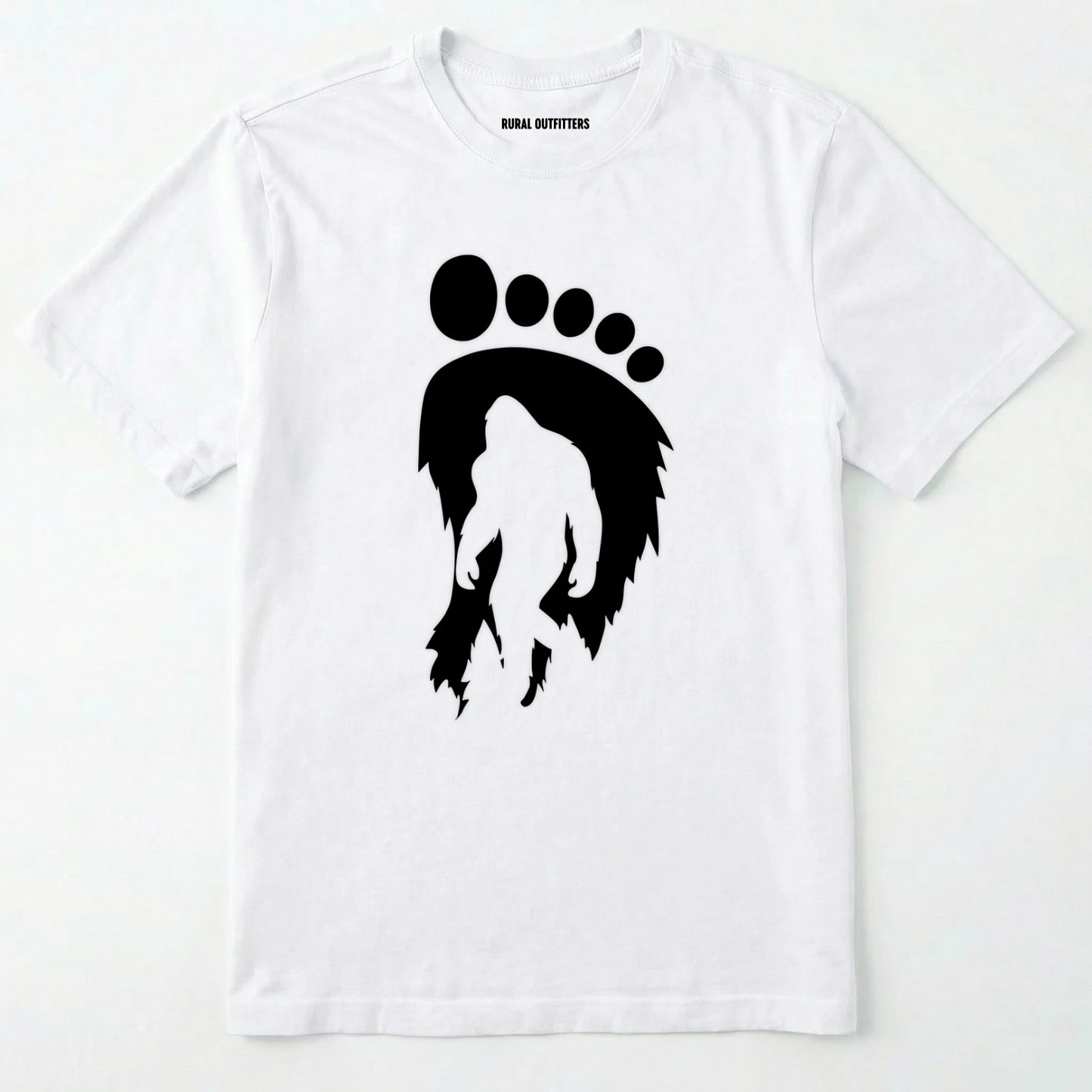 White bigfoot t-shirt with cryptid-themed footprint graphic and sasquatch silhouette on a white background.