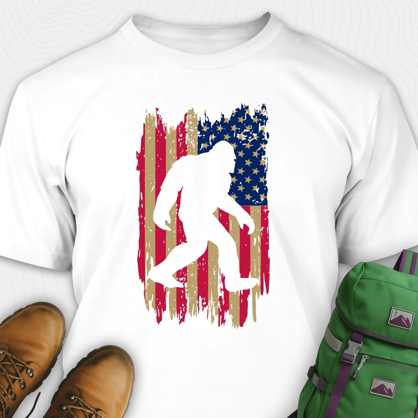 White bigfoot american flag shirt featuring patriotic grunge background