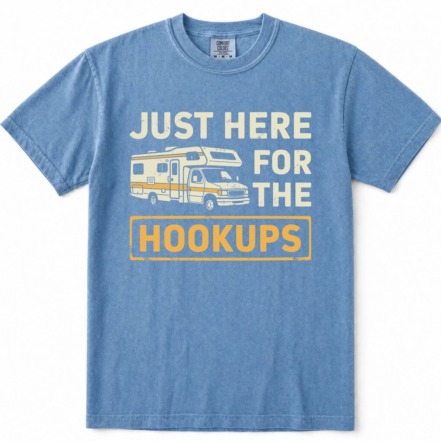 Blue Jean short-sleeve t-shirt with a vintage-style graphic print on the front. The graphic features the text 'JUST HERE FOR THE HOOKUPS' in cream and yellow lettering, accompanied by an illustration of a cream and yellow camper van.