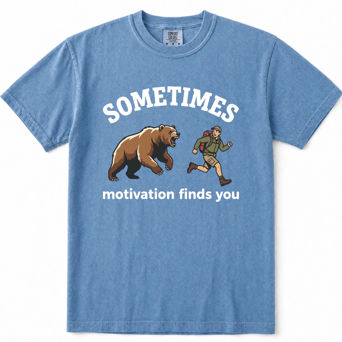 Blue Jean crewneck t-shirt featuring a graphic print of a brown bear and a hiking trail runner with the text 'SOMETIMES motivation finds you' in white.