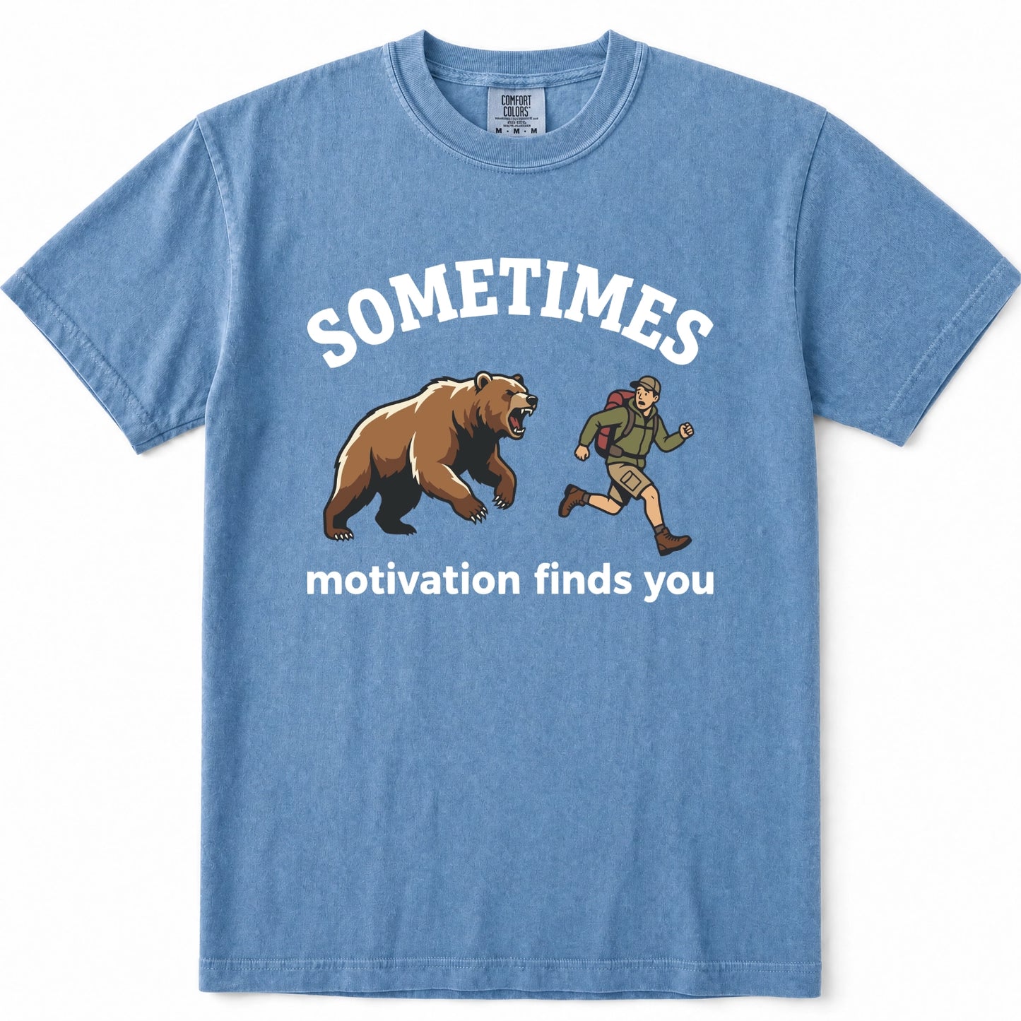 Blue Jean crewneck t-shirt featuring a graphic print of a brown bear and a hiking trail runner with the text 'SOMETIMES motivation finds you' in white.
