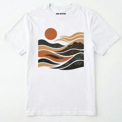White t-shirt with a graphic design of mountains and a sun on a white background
