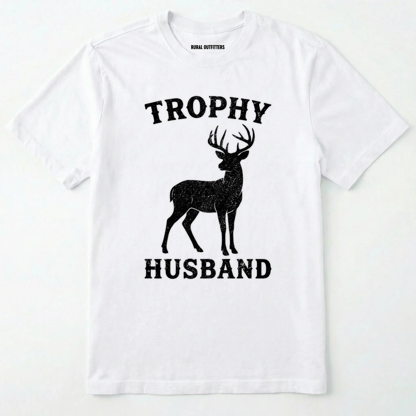 White t-shirt with black deer graphic and text 'trophy husband' on a white background