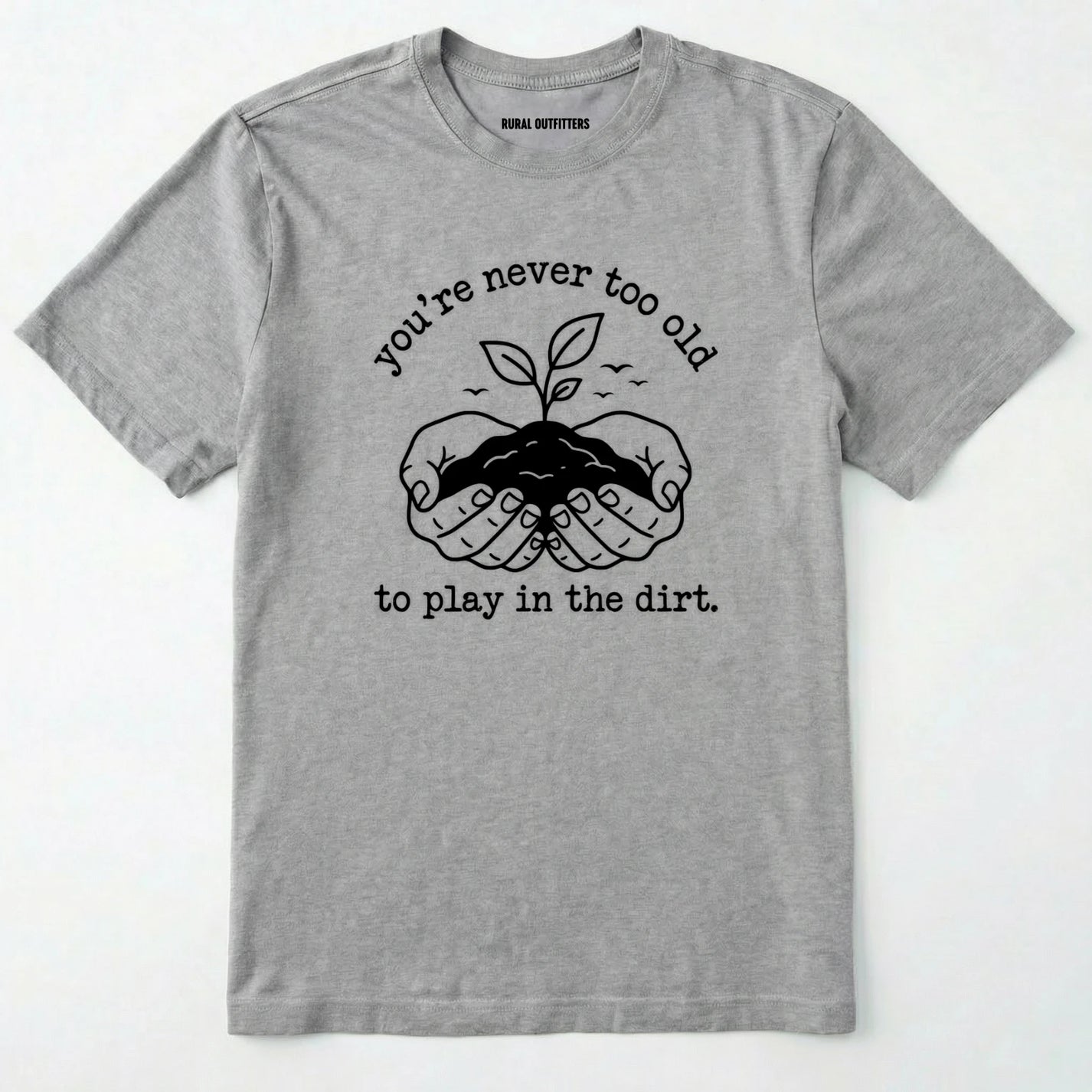 Sport Grey t-shirt with black graphic and text 'you're never too old to play in the dirt' on a white background