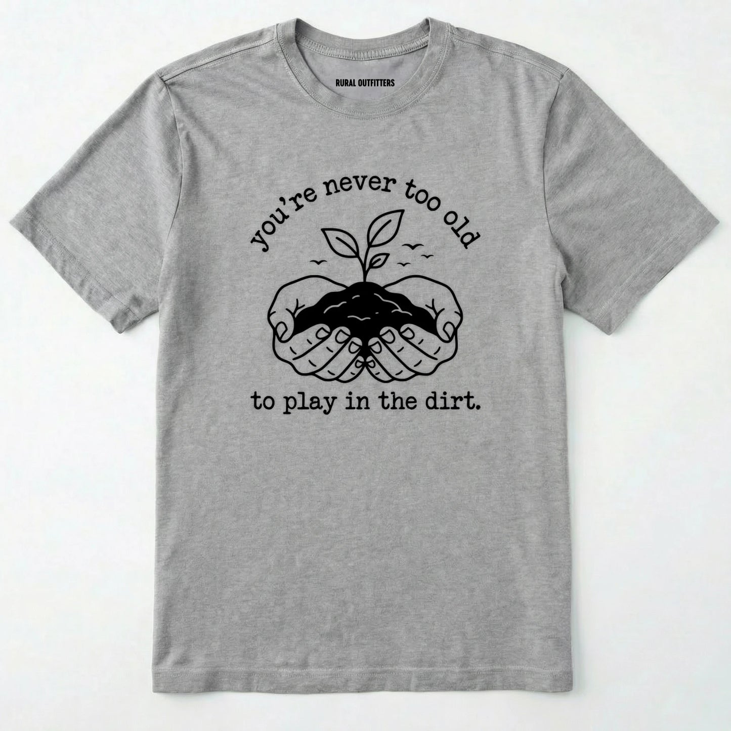 Sport Grey t-shirt with black graphic and text 'you're never too old to play in the dirt' on a white background