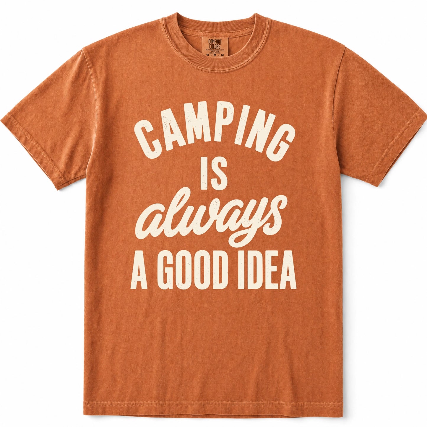 Yam short-sleeve crewneck t-shirt in a washed terracotta orange color, featuring the phrase 'CAMPING IS always A GOOD IDEA' printed in white across the front.