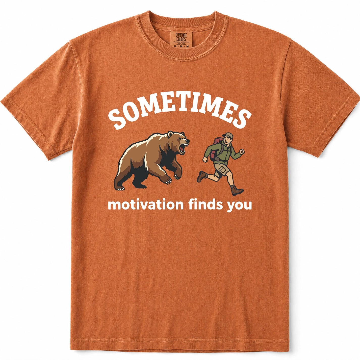 Yam crewneck t-shirt with a graphic print featuring a brown grizzly bear and a hiker, with the text 'SOMETIMES motivation finds you' in white.