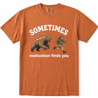 Yam crewneck t-shirt with a graphic print featuring a brown grizzly bear and a hiker, with the text 'SOMETIMES motivation finds you' in white.