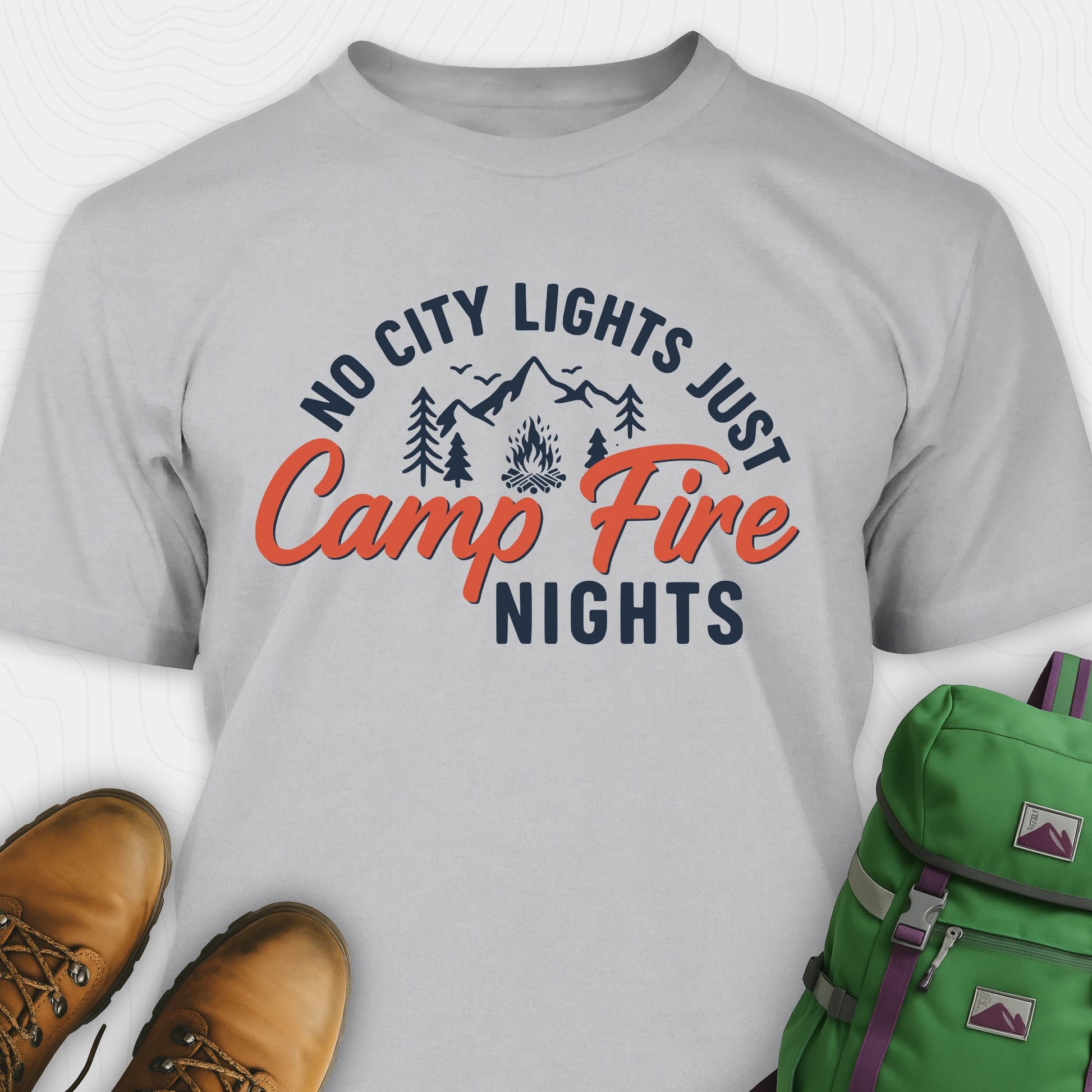 Grey campfire shirt with mountains and trees design and "No city lights just campfire nights" text
