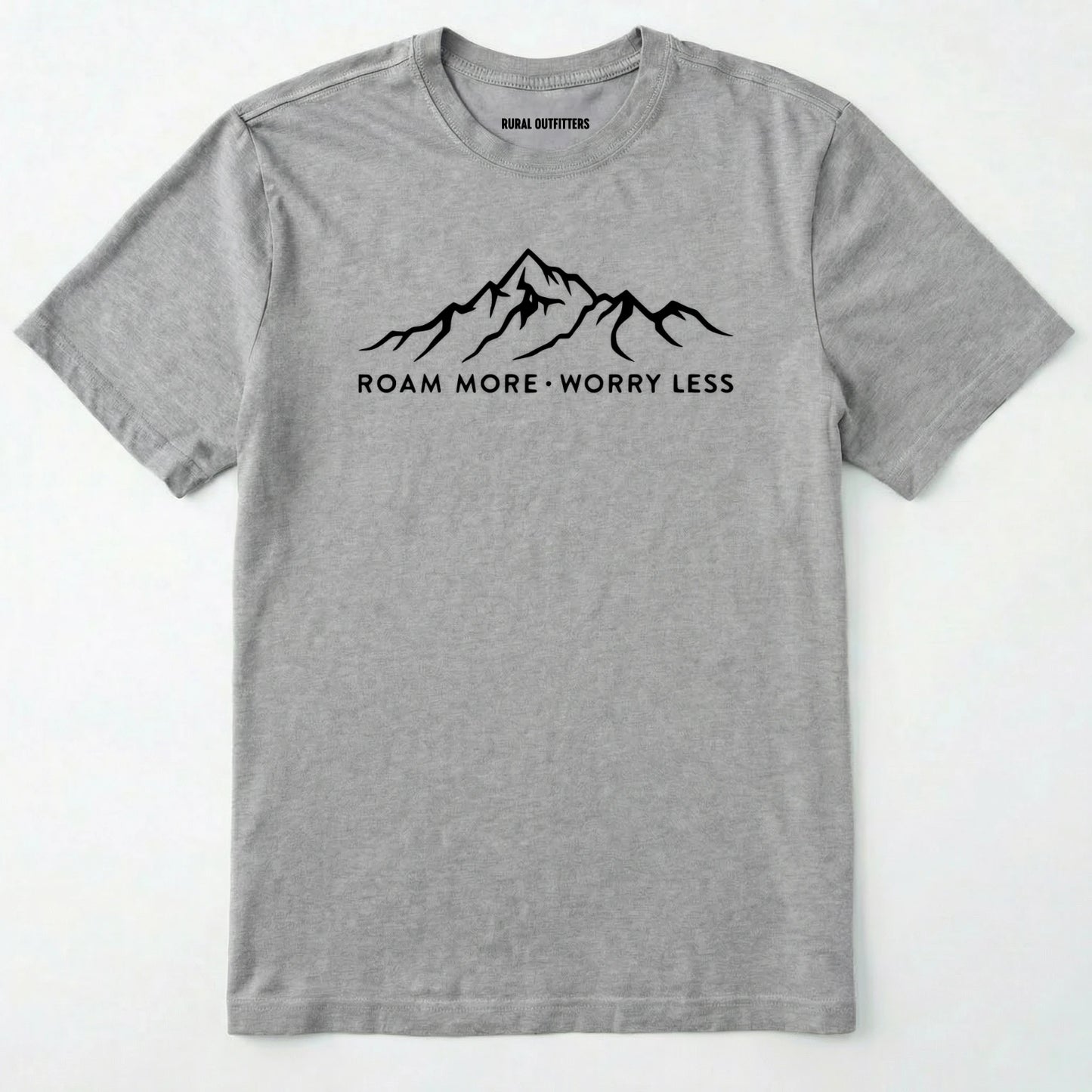 Sport Grey rocky mountain shirt with a white mountain graphic and text 'roam more worry less' on a white background