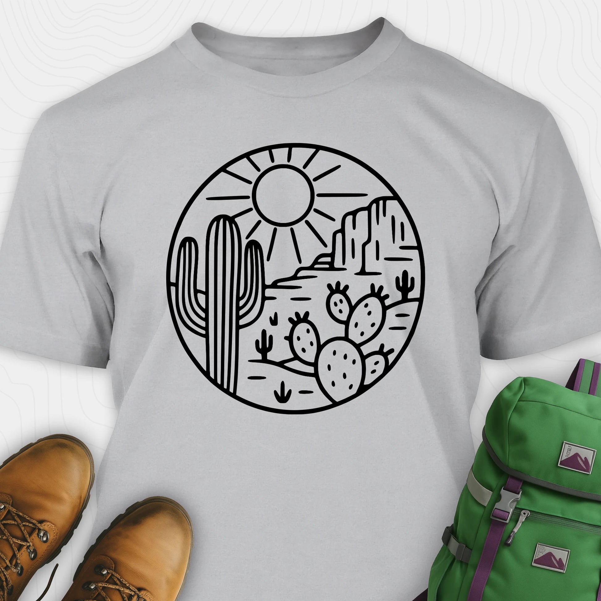 Grey cactus shirt featuring desert landscape and cactus illustration