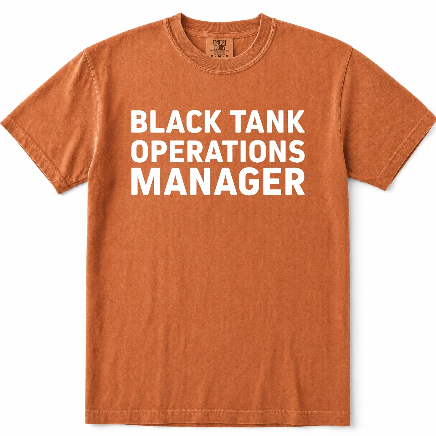 Yam short-sleeve crewneck t-shirt in a washed orange-brown color, featuring the text 'BLACK TANK OPERATIONS MANAGER' printed in bold white capital letters across the chest.