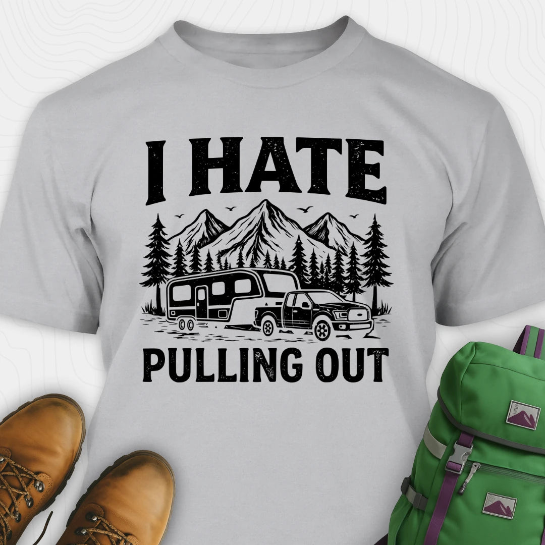 Gray t-shirt with 'I Hate Pulling Out' graphic design, brown boots, and green backpack on a white background