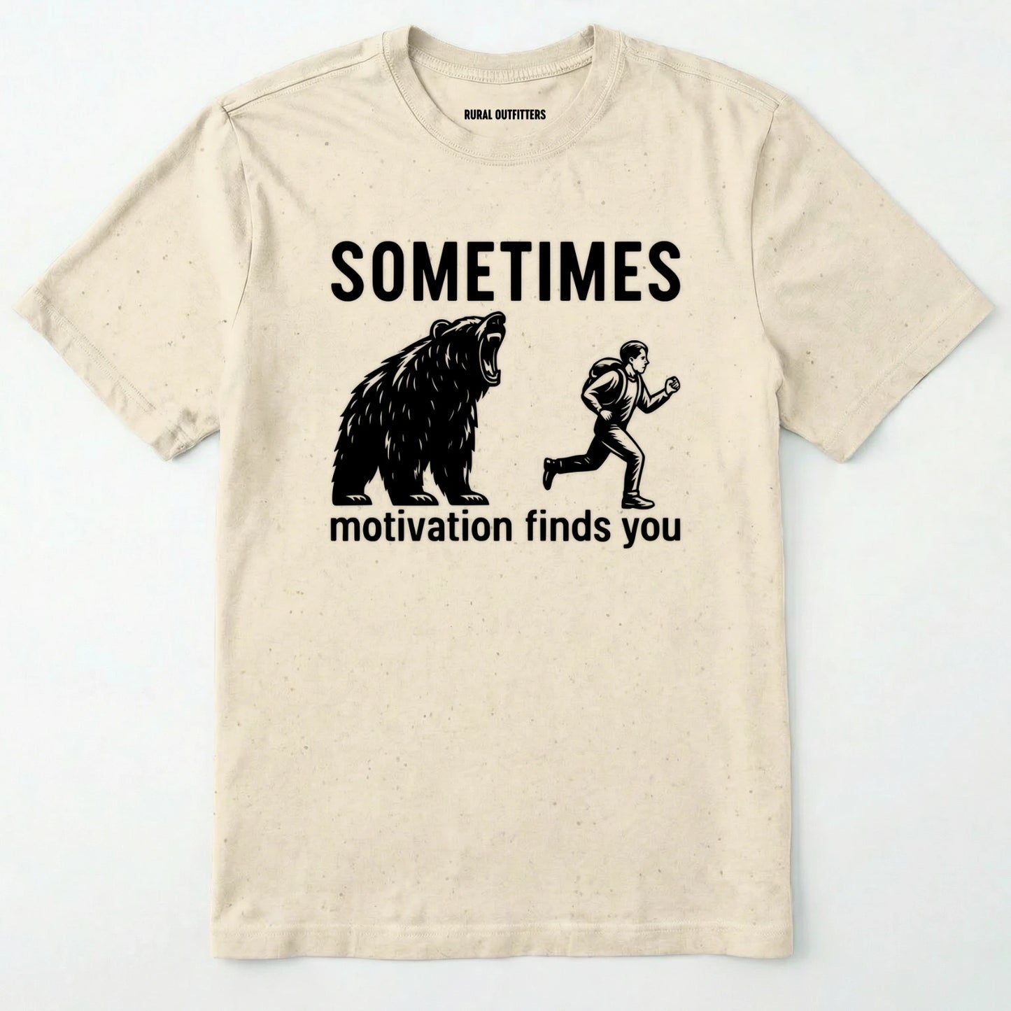 Natural motivational t-shirt with bear and person graphic and text 'sometimes motivation finds you' on a white background.