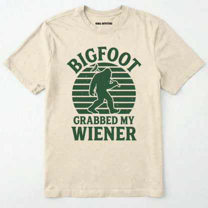 Natural bigfoot grabbed my wiener t-shirt with a funny design and text, on a plain white background.
