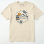 Natural let⊙s go t-shirt with retro camper van and sunset graphic, and green backpack on a white background