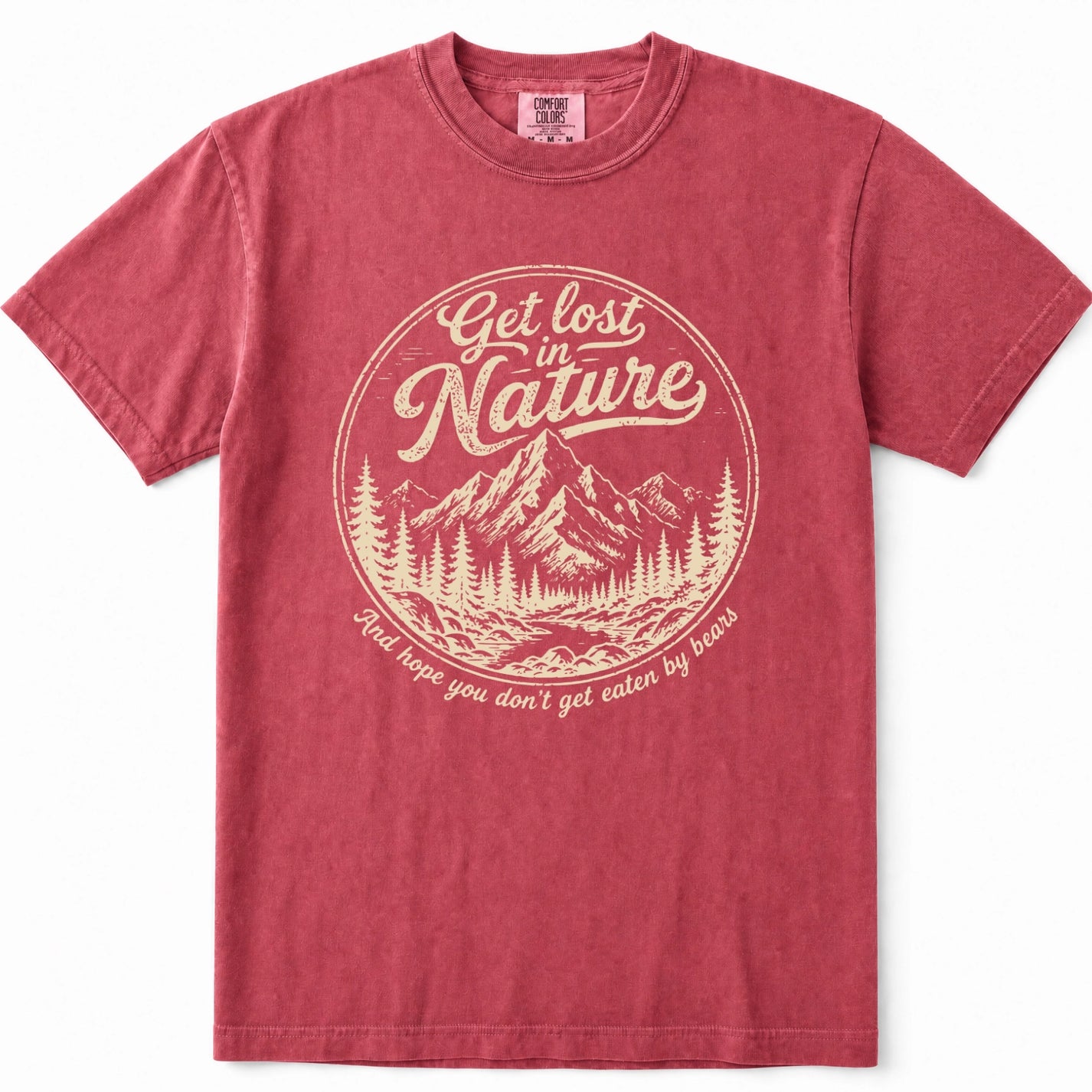 Crimson short-sleeve crewneck t-shirt in a washed, heathered red color, featuring a circular vintage-style graphic on the chest with a mountain and pine tree illustration and the text 'Get lost in Nature' and 'And hope you don't get eaten by bears'.