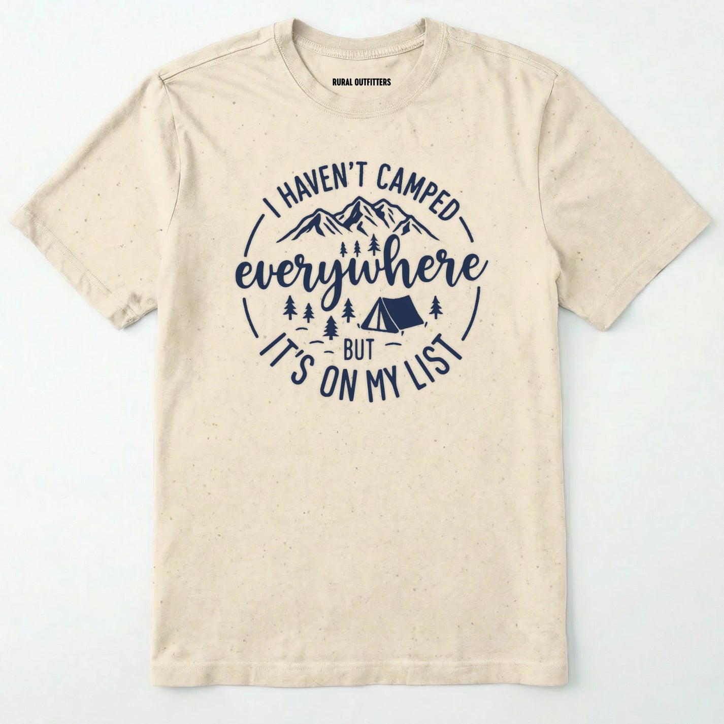Natural funny camping shirt saying with mountains, trees, tent graphic and "I Haven't Camped Everywhere But It's On My List" text on a white background.