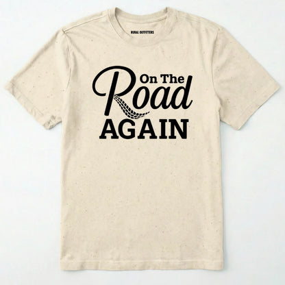 Natural road trip t-shirt with ⊜on the road again⊝ text on a white background.