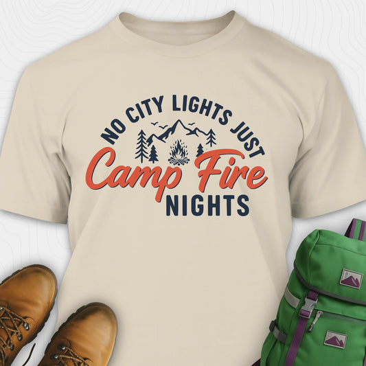Sand campfire shirt with mountains and trees design and "No city lights just campfire nights" text