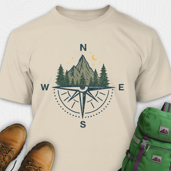 Sand compass shirt with mountains and pine trees design