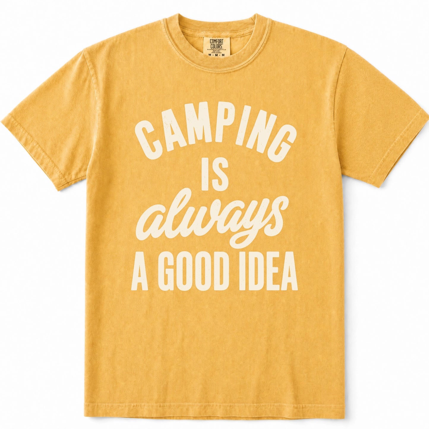 Mustard short-sleeve crewneck t-shirt with the phrase 'CAMPING IS always A GOOD IDEA' printed in white across the front, displayed on a clean white background.