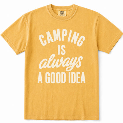 Mustard short-sleeve crewneck t-shirt with the phrase 'CAMPING IS always A GOOD IDEA' printed in white across the front, displayed on a clean white background.