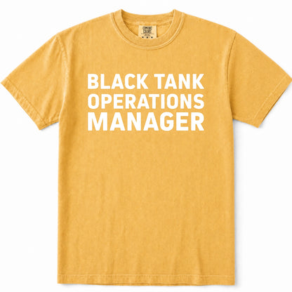 Mustard short-sleeve crewneck t-shirt with the words 'BLACK TANK OPERATIONS MANAGER' printed in bold white capital letters across the chest, displayed flat against a white background.