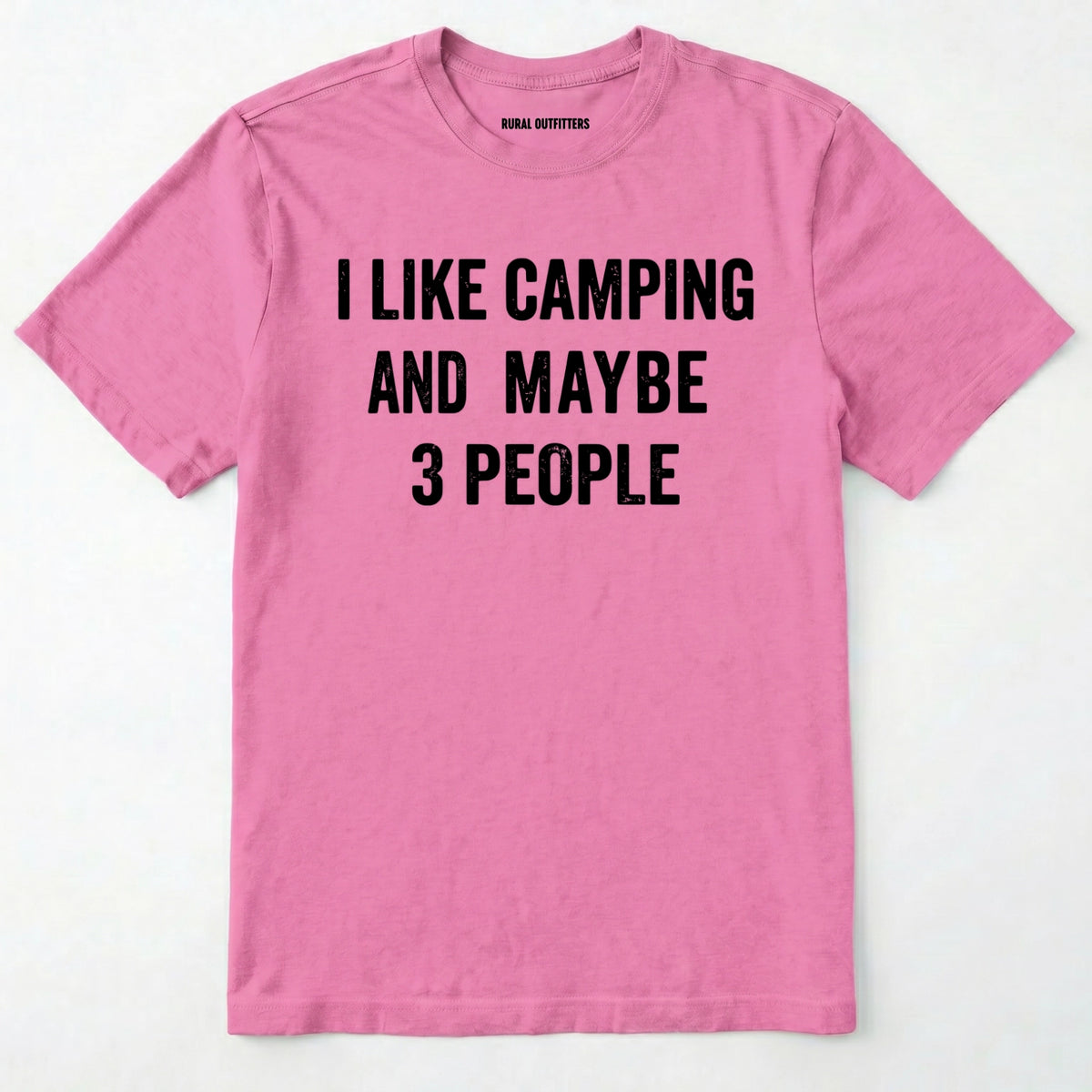Azalea short-sleeve t-shirt with bold black text reading 'I LIKE CAMPING AND MAYBE 3 PEOPLE' across the chest, laid flat against a light off-white background.
