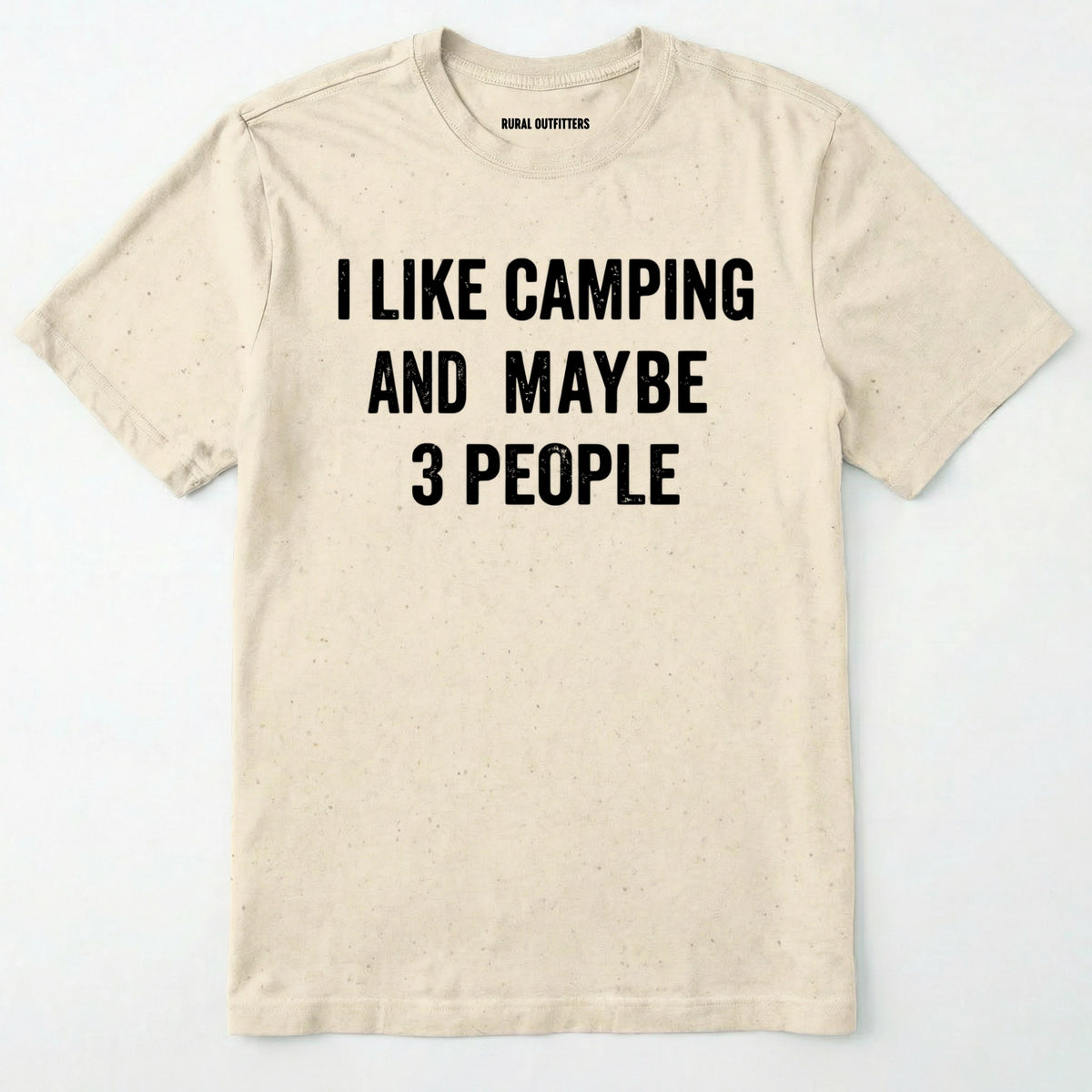 Natural short-sleeve t-shirt with bold black text reading 'I LIKE CAMPING AND MAYBE 3 PEOPLE' across the chest, laid flat against a light off-white background.