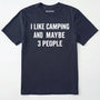 Navy blue short-sleeve t-shirt with bold white text reading 'I LIKE CAMPING AND MAYBE 3 PEOPLE' across the chest, laid flat against a light off-white background.