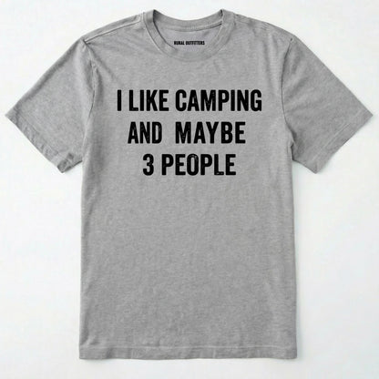 Sport Grey short-sleeve t-shirt with bold black text reading 'I LIKE CAMPING AND MAYBE 3 PEOPLE' across the chest, laid flat against a light off-white background.